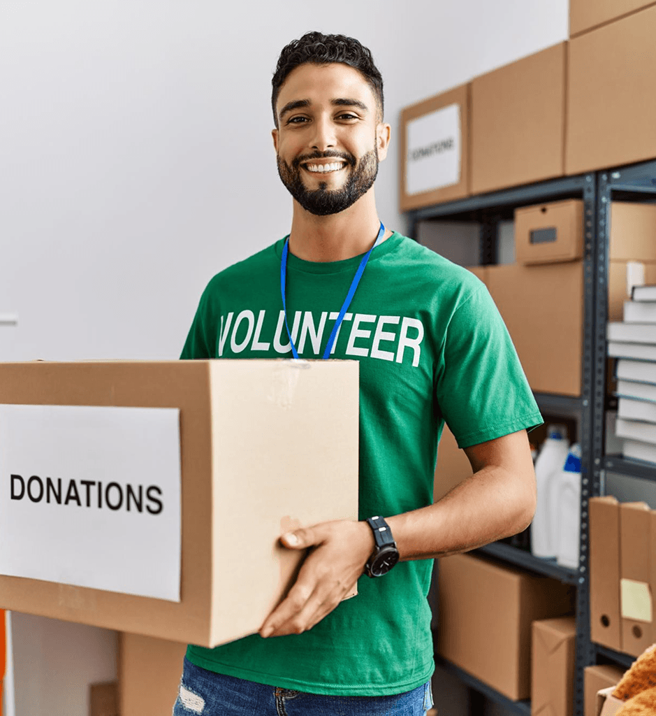 A volunteer preparing supplies for community outreach